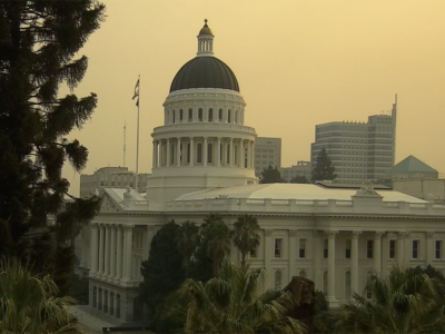 capitol building under smoke haze