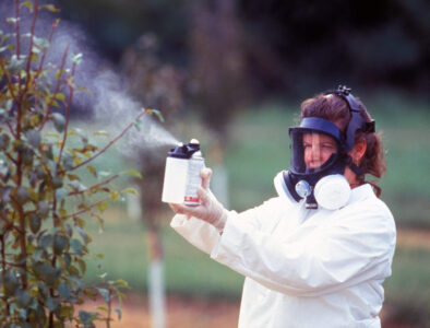 spraying pesticide