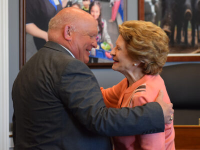 Glenn Thompson and Debbie Stabenow hugging.JPG