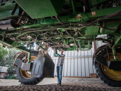 Farmer repairing